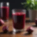 Vibrant glass of beet juice on a wooden table