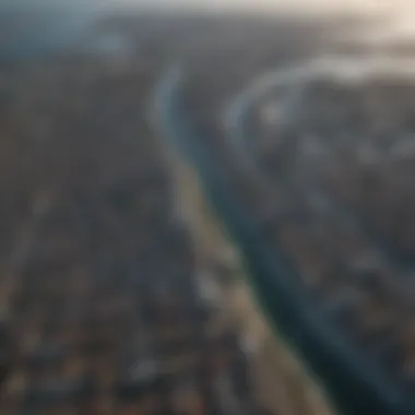 Impact of Sea Level Rise on Coastal Urban Areas Aerial view of coastal city facing sea level rise